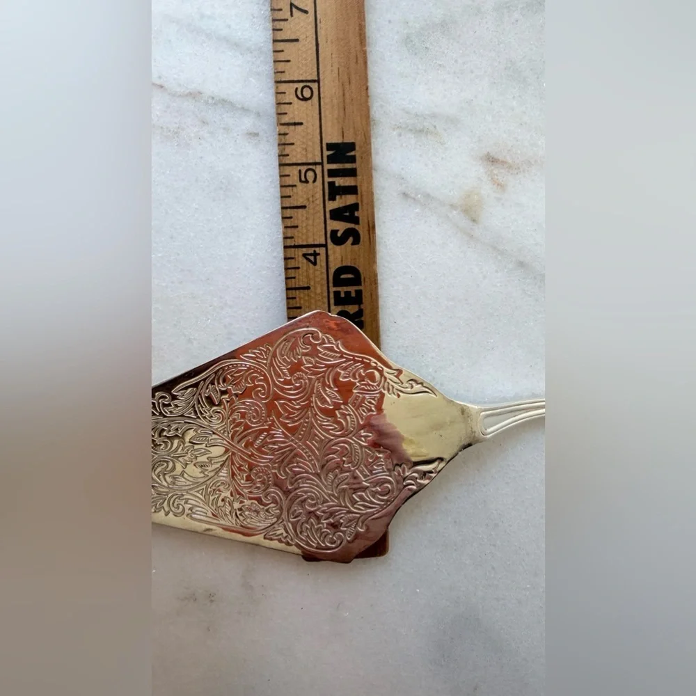 vintage silver-plated pie or cake server, frequently produced in Italy